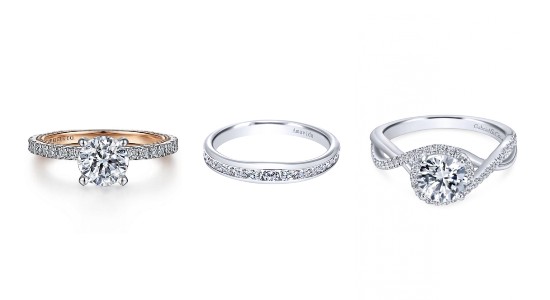 Three Gabriel & Co. bridal jewelry rings in a line
